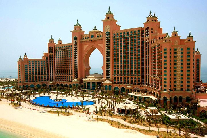 Experience the luxurious allure of Dubai with visits to iconic landmarks like the Blue Mosque and Palm Jumeirah blending rich culture with stunning architecture in this unforgettable adventure.